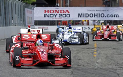 2012 IndyCar at Toronto: Dario Franchitti (#10) leads the field on the opening lap.