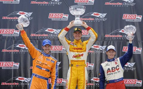 2012 IndyCar at Toronto: Charlie Kimball (2nd), winner Ryan Hunter-Reay (center)  Mike Conway (3rd) in Victory Lane.