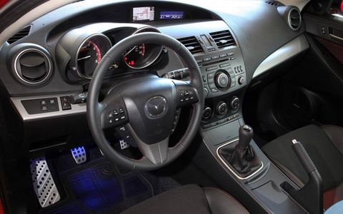 Motor vehicle, Steering part, Mode of transport, Automotive design, Product, Steering wheel, Transport, Speedometer, Center console, White, 