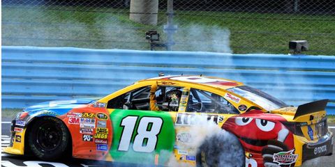 Kyle Busch celebrated his third NASCAR Sprint Cup Series win of the year with a burnout at Watkins Glen.