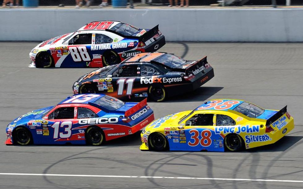 13-15 August, 2010, Brooklyn, Michigan, USA Max Papis, Denny Hamlin and Dale Earnhardt Jr. go three wide. &Copy; 2010, LAT South , USA LAT Photographic