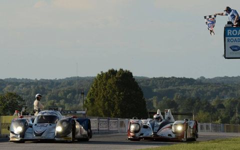 Dyson Racing edges Muscle Milk Racing by 0.083 seconds at Road America on Saturday.