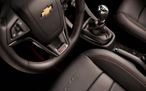Sonic RS-specific interior features include leather and microfiber-trimmed seats, flat-bottomed steering wheel and aluminum pedals.
