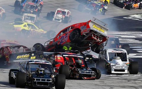 Crash landing // The No. 25 Havoline Plus SVC/Shady Grady Racing Chevrolet, driven by John Smith, goes airborne as other cars spin during the NASCAR Whelen Modified Tour UNOH Perfect Storm 150 at Bristol Motor Speedway on Aug. 22.