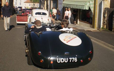 A Jaguar C-type in line for the start of the touring rally.