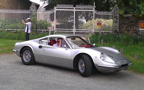 A Ferrari Dino 246GT stops for a break during the touring rally.