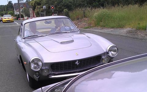 One of two silver Ferrari 250 GT Lussos which ran together all day during the touring rally.