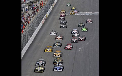 Oriol Servia (right) and Dario Franchitti (left) lead the field at the start of the IndyCar race in Loudon, N.H. on Aug. 14. Photo by: Walt Kuhn/LAT Photographic