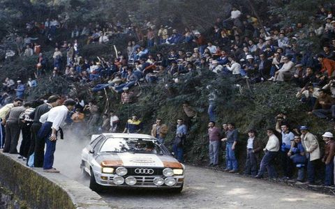 World Rally fans are known for both daring and, sometimes, stupidity when it comes to watching their heroes. A perfect example is this scene from the 1983 Portuguese Rally, where fans line the mountain road to see Hannu Mikkola and co-driver Arne Hertz speeding past in their Audi Quattro A1.
