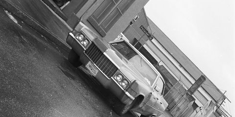 This battered Cadillac, parked at the intersection of Peterson and Glascock in East Oakland, was only 19 years old when this photo was taken.