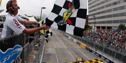 Ryan Hunter-Reay takes the checkered flag in Baltimore.