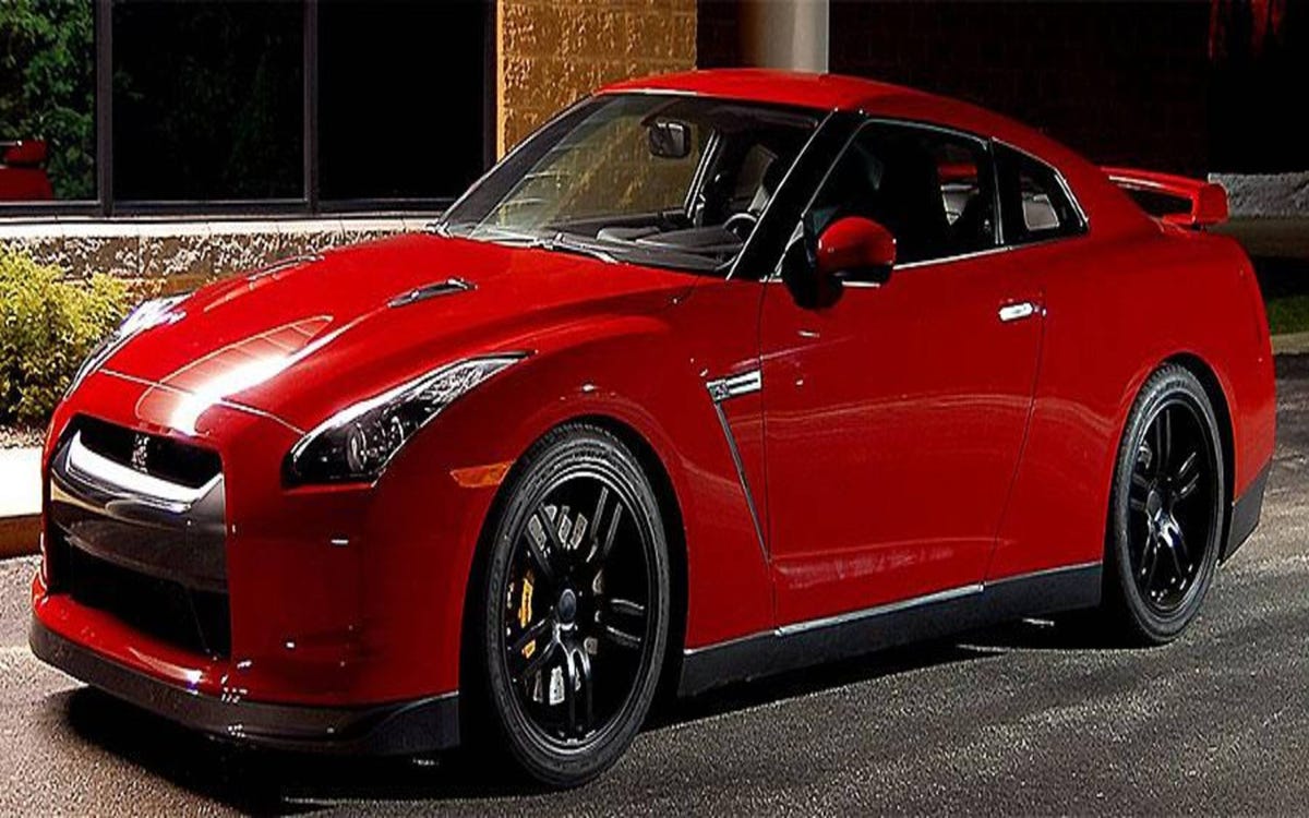 Parking Garage Nissan Gtr R Car That Has A Red Engine And Is