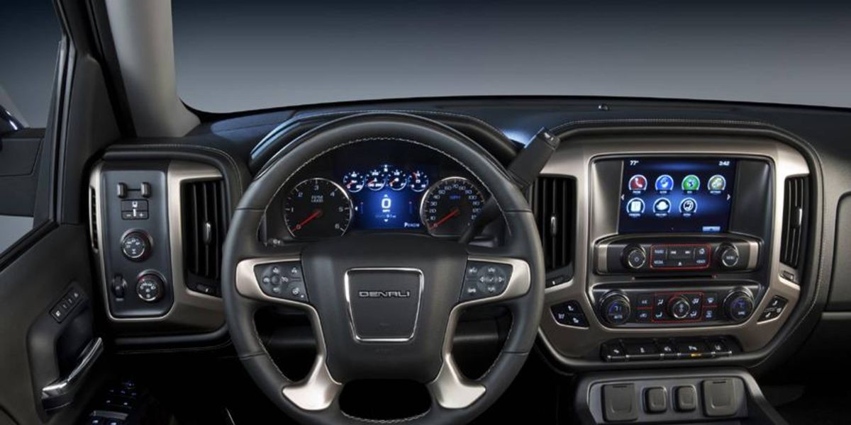 The interior of the 2014 GMC Sierra 1500 is well appointed for a truck.