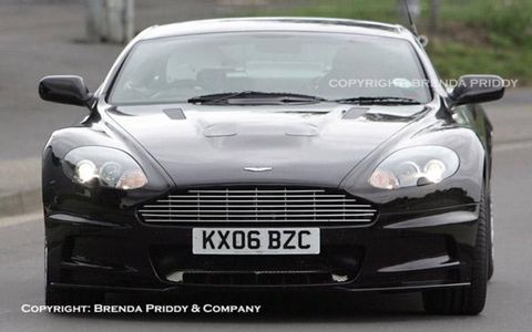 Aston plans to build 300 road versions of the car based on the DB9. DBRS9, spied testing at N&uuml;rburgring, features a wider track, lower ground clearance, bolder air intakes and a performance boost from 450 to 500 hp from the V12 under the hood. The Bond movie is out in November, so look for the DBRS9 soon thereafter, priced at about $250,000.