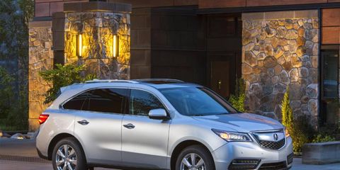 The 2014 Acura MDX SH-AWD is equipped with a 3.5-liter V6 mated with a six-speed automatic.