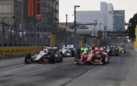 2012 IndyCar Grand Prix at Baltimore: Will Power and Scott Dixon battle for the lead at the start.