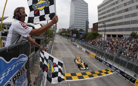2012 IndyCar Grand Prix at Baltimore: Winner Ryan Hunter-Reay takes the checkered flag and the win