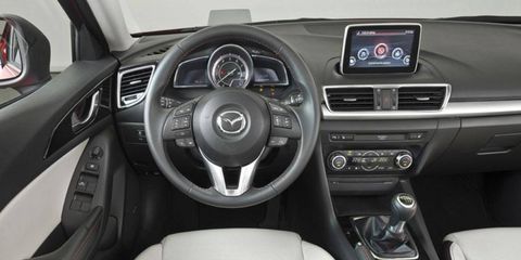 Motor vehicle, Steering part, Automotive design, Mode of transport, Product, Steering wheel, Automotive mirror, Center console, White, Vehicle audio, 