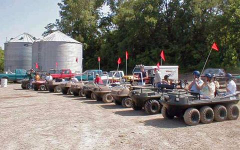 A group of modern-day amphibious all-terrain vehicle (AATV) enthusiasts gather before hitting the trail.