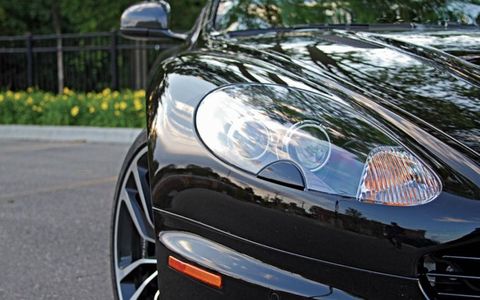 A close-up view of the headlight on the Aston Martin DBS Carbon Edition.