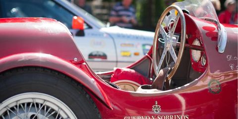The curvaceous cabin of a 1951 Ermini Sport Siluro adorned with the logo of Swiss watch company Cuervo Y Sobrinos title sponsor andd co-organizer of the Summer Marathon Rally.