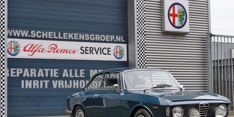 The 1964 Alfa Romeo Giulia Sprint GT riding on new springs, wheels and tires. Not bad at all.
