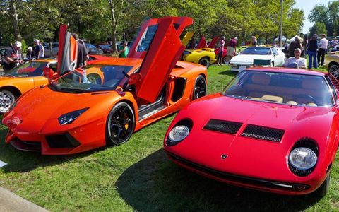 Lamborghini heritage: a vintage Miura sits next to an example of its maker's current standard-bearer, the Aventador.
