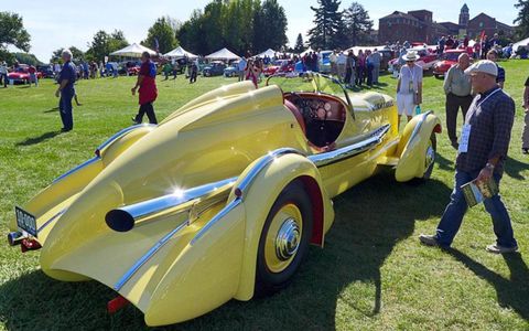 The streamlined 1935 Duesenberg SJ racer known as the Mormon Meteor and once raced by Ab Jenkins gleams in the morning sunlight.