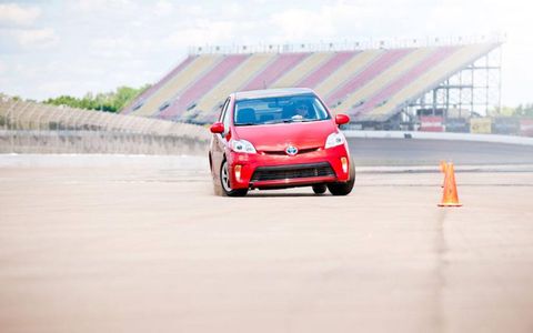 The 2012 Toyota Prius Four hits the slalom course at Michigan International Speedway.