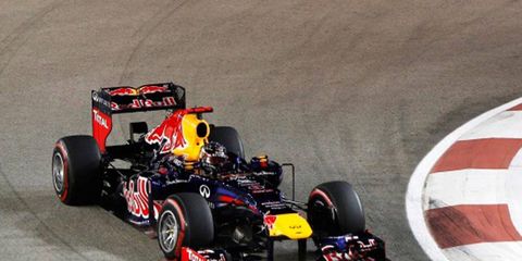 Sebastian Vettel moved into second place in the Formula One points chase with his win in Singapore on Sunday.