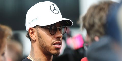 Lewis Hamilton showed up for media obligations in London on Thursday after missing Wednesday's fan activities.