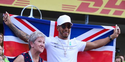 Lewis Hamilton celebates his fourth Formula 1 championship with his mom in Mexico on Sunday.