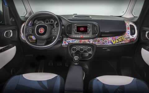The instrument panels features heavy usage of Vans' stickers.