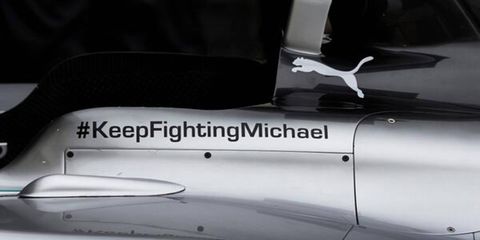 The phrase 'Keep Fighting Michael' has been removed from the Mercedes cars this season.