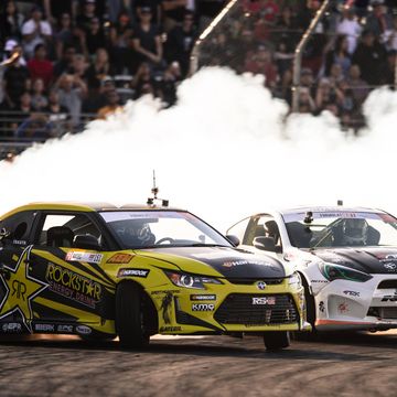 Fredric Aasbo leads Aurimas "Odi" Bakchis in the final round of Formula Drift on the streets of Long Beach.