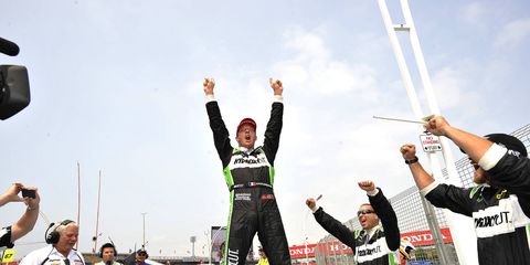 Sebastien Bourdais celebrates his IndyCar Series win in Toronto on Sunday.