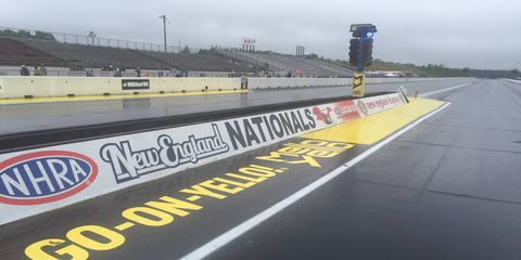 Rain pushed back the NHRA New England Nationals to Monday.