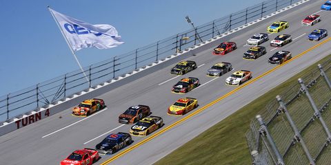 Cars of the NASCAR Sprint Cup Series practice at Talladega Superspeedway on Friday.