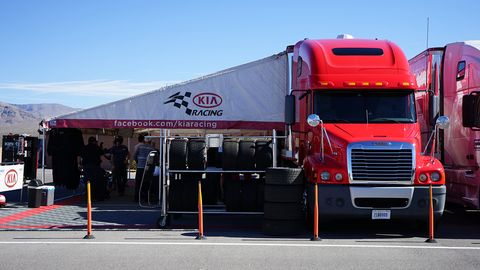 The team trailers are set up like this during races, bringing in fans to the Kia fold.