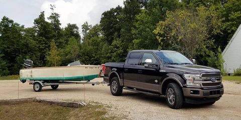 The F-150, boat in tow. It's a 16-foot "Malahini" runabout built from plans by Glen-L.