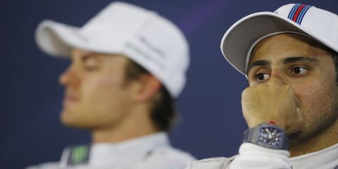 Williams F1 driver Felipe Massa and Mercedes' Nico Rosberg at the press conference following the Brazilian Grand Prix on Sunday.