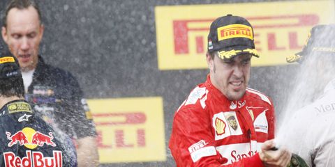 Ferrari's Fernando Alonso celebrates a podium finish at the Hungaroring in July. The vet has had difficulty this year finishing in the top 3 -- something Sergio Marchionne looks to change.