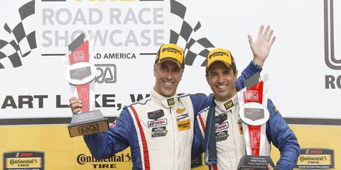 Joao Barbosa and Christian Fittipaldi on the podium after their Prototype win at Road America in August.