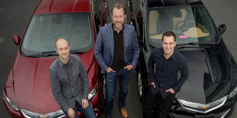 GM president Dan Ammann (center) is flanked by Lyft co-founders John Zimmer (right) and Logan Green.