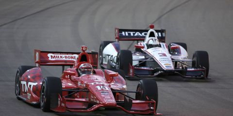 Tony Kanaan, left, and Helio Castroneves, right, will be racing in their home country when the Verizon IndyCar Series returns to Brazil for a race on March 8, 2015.