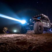 A Baja Designs SLDLaser headlight blasting into the night. I didn't ride in this rig, but did get a laser demo ride in a Baja prerunner. Look at that beam!