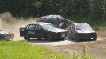 The drivers were good about not punting each other into the woods on purpose, but the tight confines and short race heats led to quite a bit of rubbin' and bumpin'. Here's Daniel Nordin's Opel climbing up onto Jan Kastberg's Volvo and Sven-Inge Sjödin's BMW. Fortunately, the Opel ended up on its wheels in this incident.