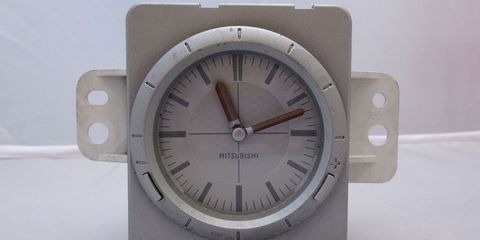 Most analog dashboard clock mechanisms of this era were just stepper motors controlled by the car's computer, but this Jeco unit is a stand-alone clock.