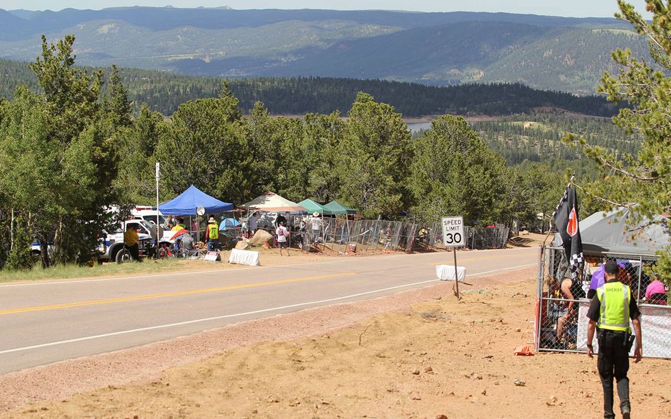 Because of incidents with spectators wandering in front of race cars last year, the PPIHC organizers installed fencing around Halfway Picnic Ground and other spectator areas on the mountain. This made the campsite fairly crowded, so we were fortunate that we arrived with the Checker ahead of most of the crowd.
