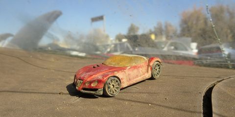 This weathered 2002 Hot Wheels Golden Arrow spent many years on the dash of this '85 Subaru.